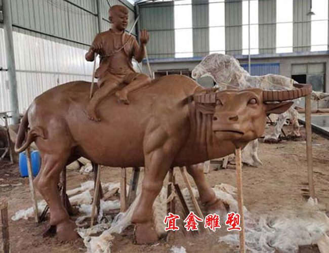 騎牛人物雕塑
